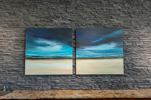 Two ocean paintings on stone wall - no white elements